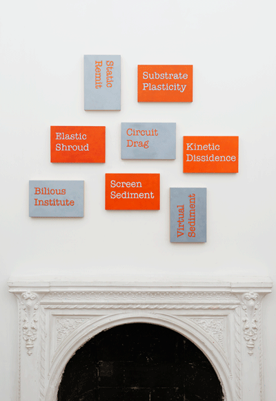Text painting installation by Lynne Barwick, 8 paintings above a fireplace